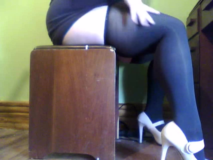 Still from clip titled Feet Striptease