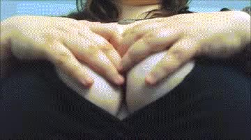 Still from clip titled Tight Tit Tease